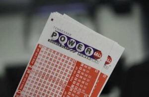 Tennessee Powerball lottery tickets showing the Powerball logo, Double Play option, and marked number selections.